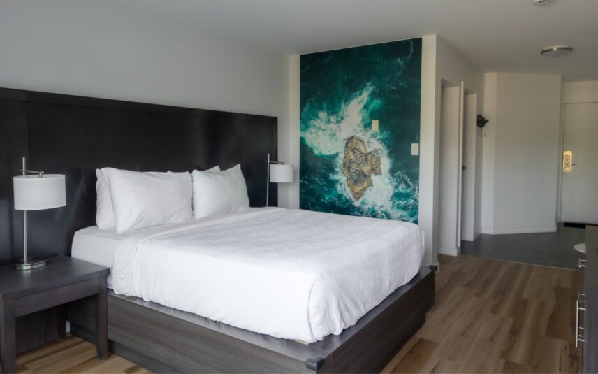 Deluxe room in Tofino with west coast-inspired art and cozy furnishings