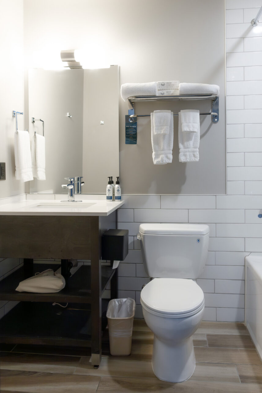 Tofino hotel bathroom with sleek fixtures and fresh towels