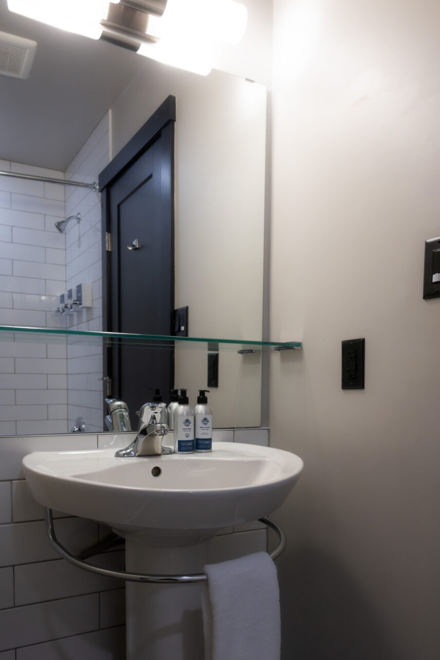 Clean, neat, hotel bathroom with local soaps