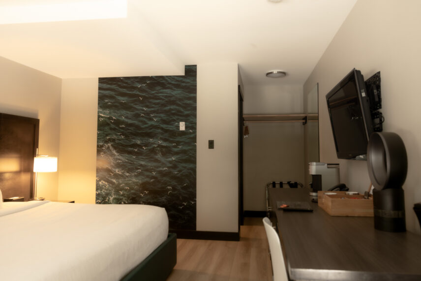 Standard king room showcasing comfy bed modern decor