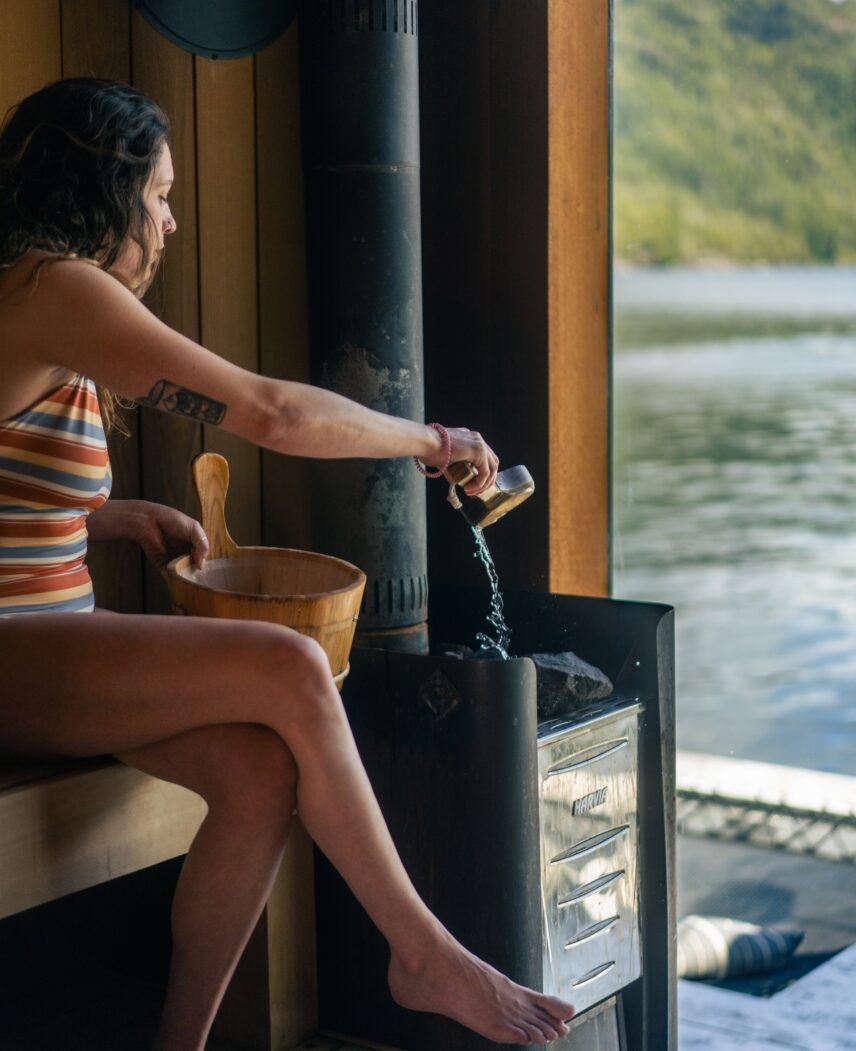 Woman inside the floating sauna
