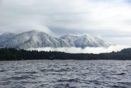 Snowy mountains over the ocean in Tofino Clayoquot Sound