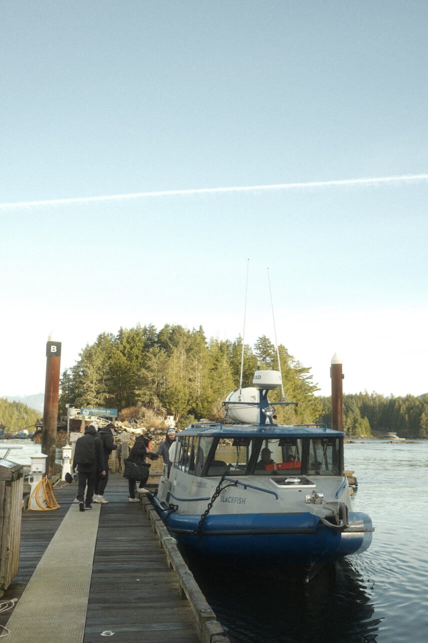 tofino resort + marina boat on the dock with guests getting on