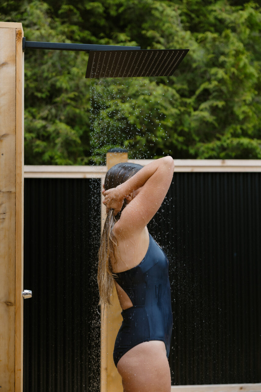 woman enjoying the rain shower